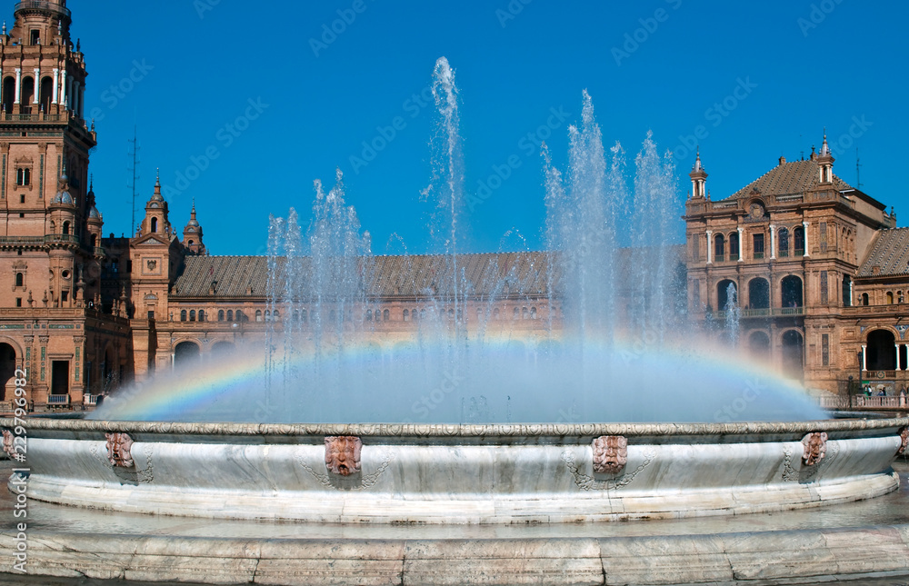View of Plaza de Espaa in Sevilla with the rainbow in the fountain