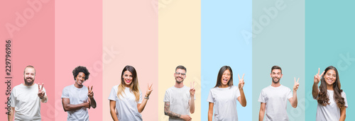 Collage of different ethnics young people wearing white t-shirt over colorful isolated background smiling with happy face winking at the camera doing victory sign. Number two.