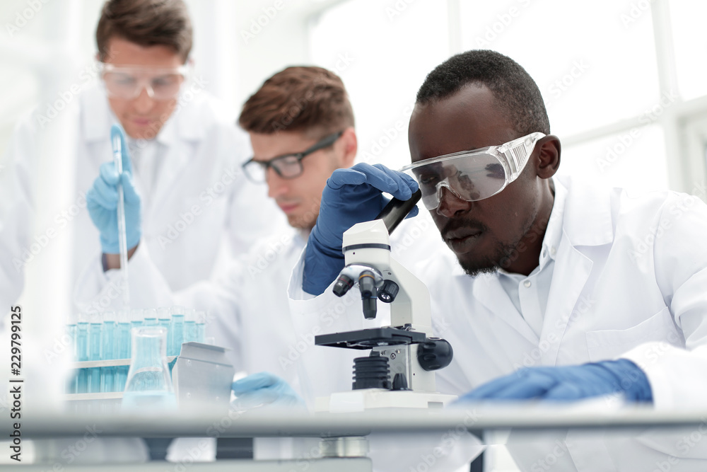 close up.a multinational group of scientists is conducting research