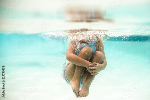 Child doing a cannonball