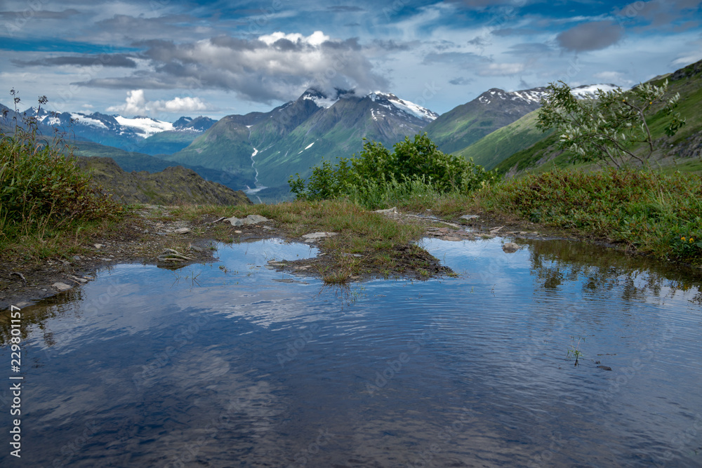 Small pond along the Trail of 98 off the Richardson Highway near Valdez Alaska. This was an original trail of the Klondike Gold Rush, and goes through mountains and glaciers