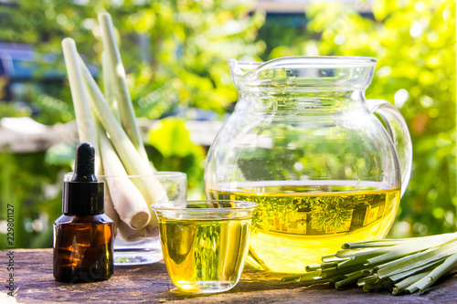 Lemongrass essential oil is placed on the table using a hand-drip oil lemongrass oil - spa and insect repellent.