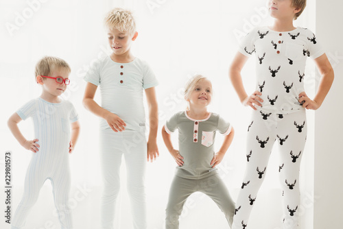 Blond siblings playing at home