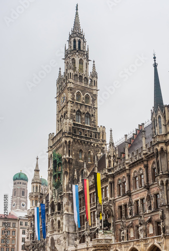 The clock tower of the new City Hall (Rathaus) in Marienplatz is a famous building in Gothic architecture - Munich, Bavaria, Germany, Europe