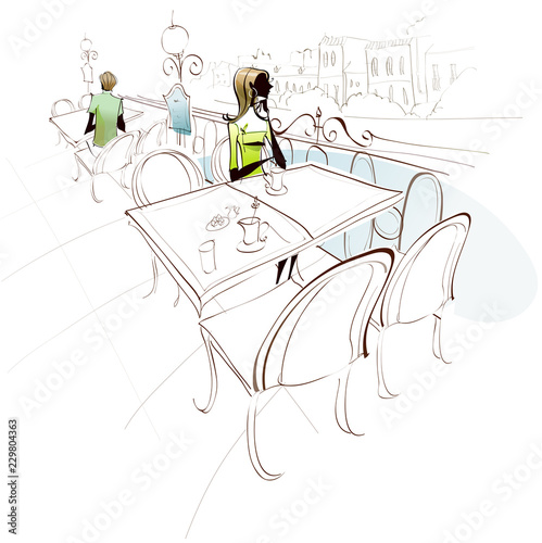 Woman sitting on a chair in a restaurant