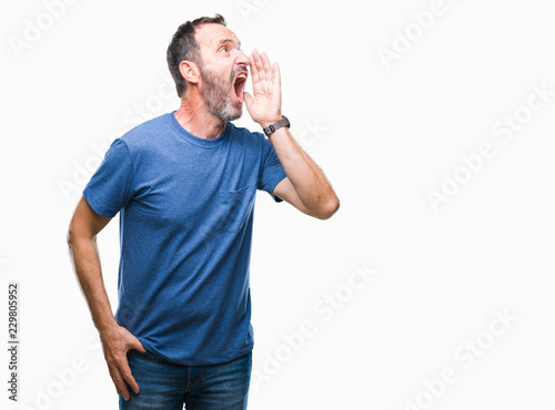 Middle age hoary senior man over isolated background shouting and screaming loud to side with hand on mouth. Communication concept.