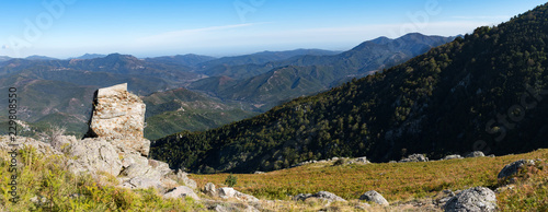 Panoramic view of the Regional Natural Park of Corsica, taken in central Corsica on the slopes of Monte Cardo looking out across Venaco and its local region out to the eastern coast in the distance.