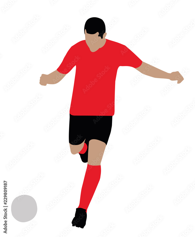 Portrait Of A Soccer Player Kicking Football