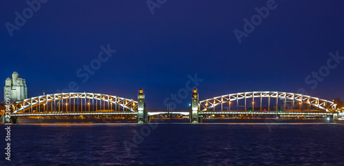 Bolsheokhtinsky bridge the Neva River in St. Petersburg at the blue hour and evening illumination