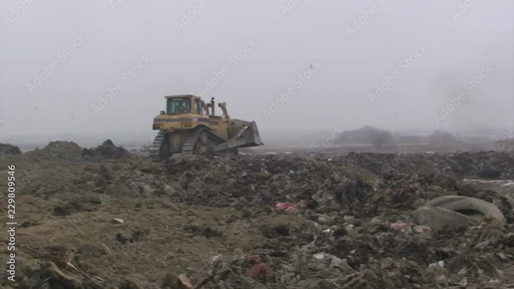 trucks brought garbage to the landfill trucks brought garbage to the landfill