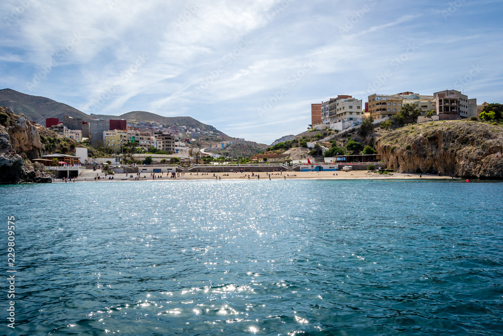 Beautiful background of a Moroccan  beach with waves and sea in summer in Al hoceima