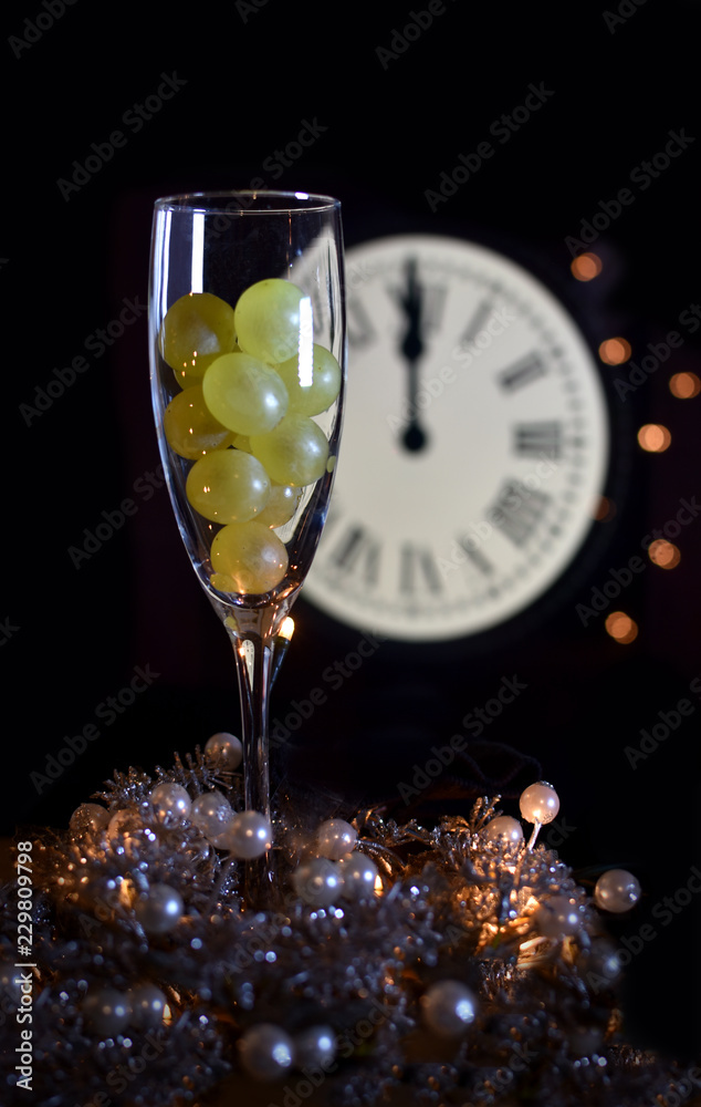 CELEBRATION OF THE NEW YEAR, TRADITION OF TWELVE GRAPES OF LUCK WITH
