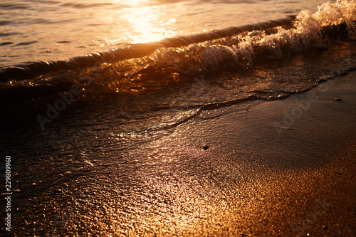 Sunset sea waves photo