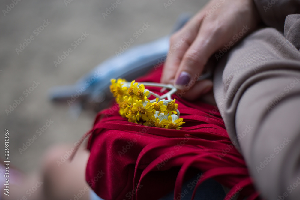 yellow summer flowers in the hand yellow summer flowers in the hand