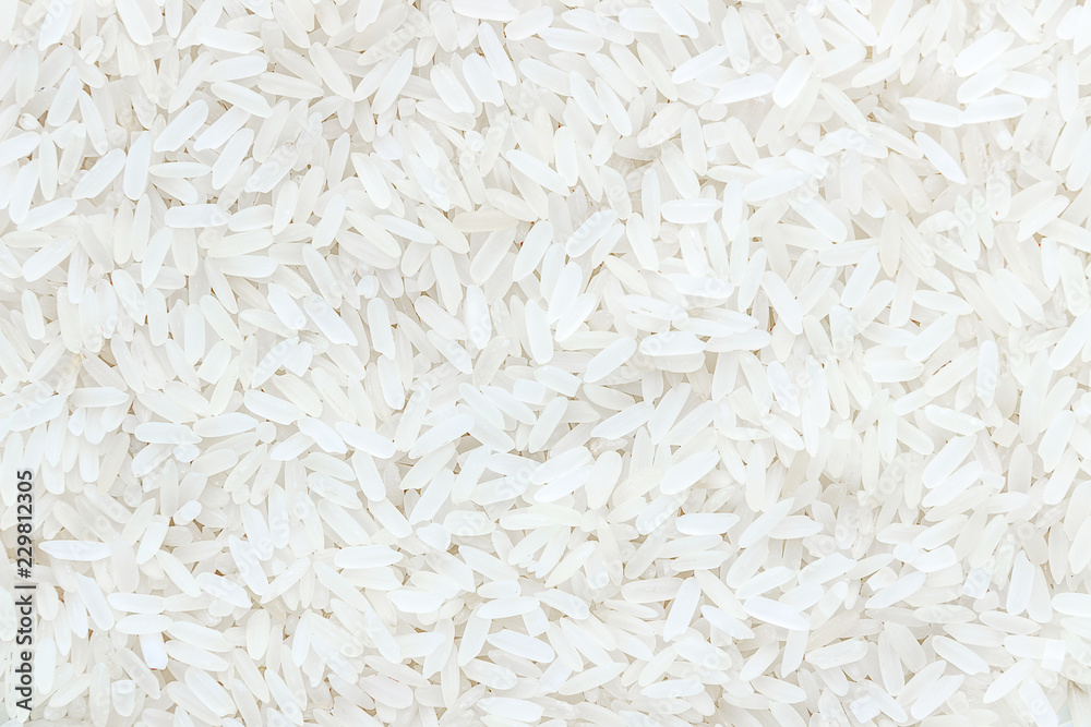 The natural texture - white rice closeup. The top view The natural texture - white rice closeup. The top view
