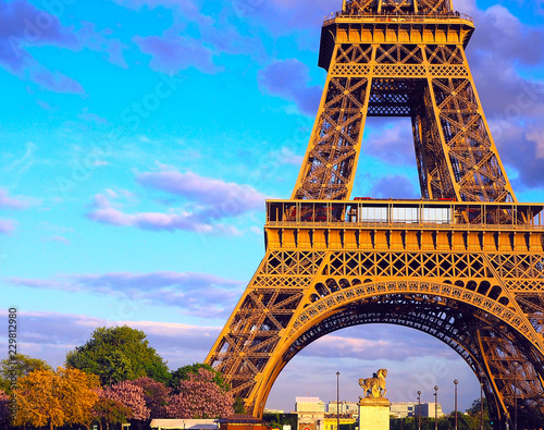 Eiffel Tower, bridge with sculpture on River Seine in Paris, France