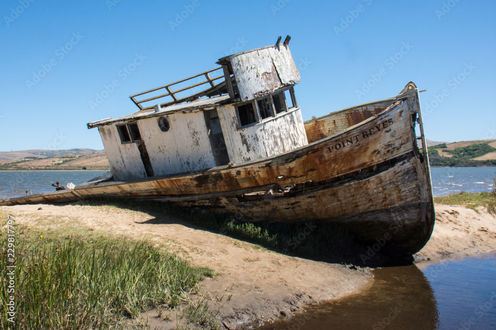 Point Reyes shipwreck, an abandoned boat located in Inverness California, in the Point Reyes National Seashore Point Reyes shipwreck, an abandoned boat located in Inverness California, in the Point Reyes National Seashore