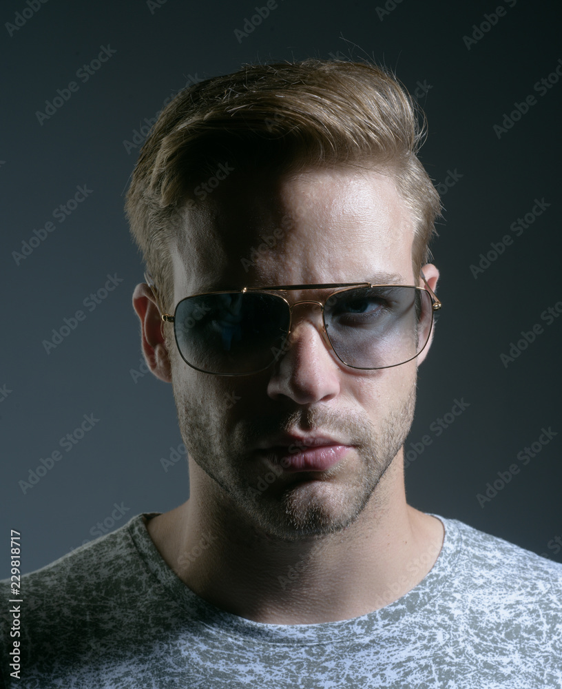 An intellectual look. Fashion model in trendy sun glasses. Man of fashion. Fashion  eyewear. Handsome man wear eye glasses. Fashionable and contemporary eyewear  Stock Photo | Adobe Stock