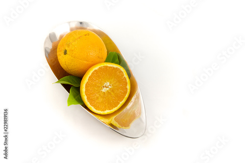 Obraz na płótnie Oranges in a silver bowl w salonie