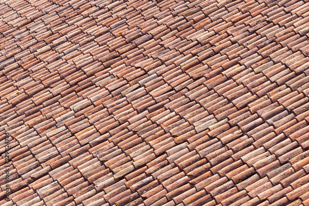 Beautilful old red tiles on a roof in Italy Beautilful old red tiles on a roof in Italy