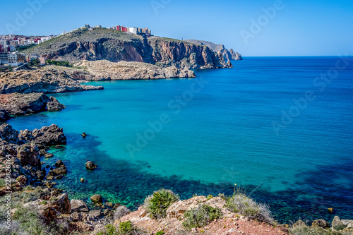 Beautiful background of a Moroccan  beach with waves and sea in summer in Al hoceima photo