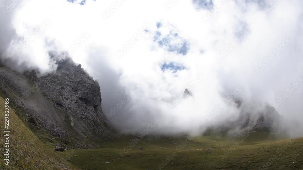 Time lapse of clouds over mountain tops. Time lapse of clouds over mountain tops.