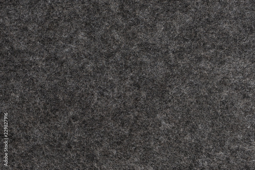 Dark Grey felt texture. Closeup view. photo