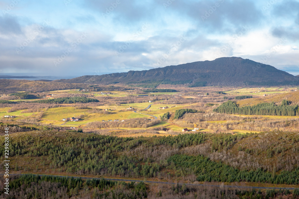 Naklejka premium Wanderlust to Hjortheia mountain in Bronnoy municipality, autumn in Northern Norway