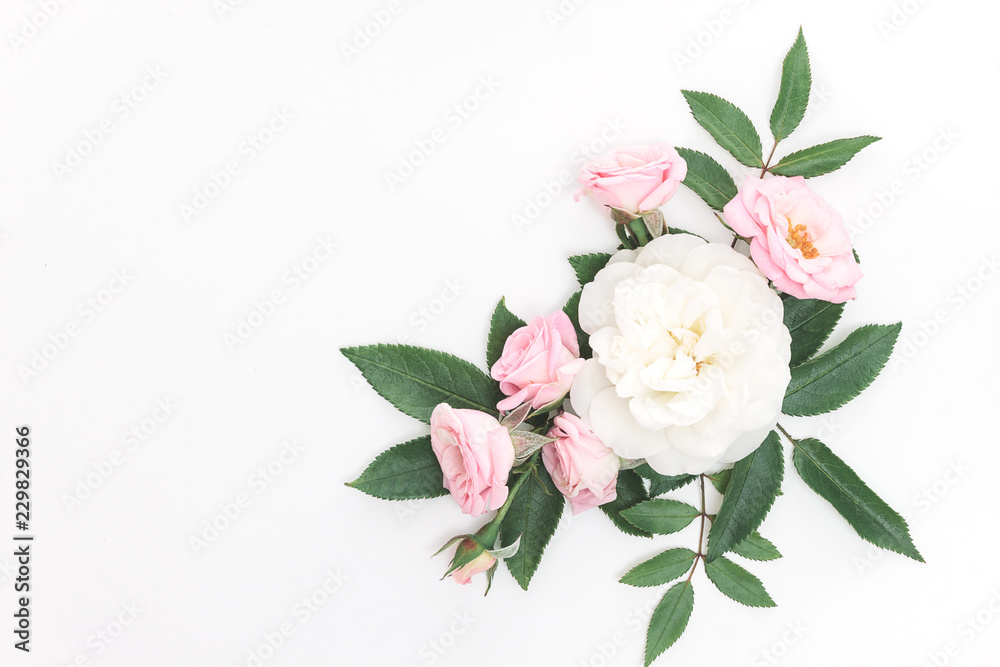 Festive flower composition on white background. Top view. Overhead Festive flower composition on white background. Top view. Overhead