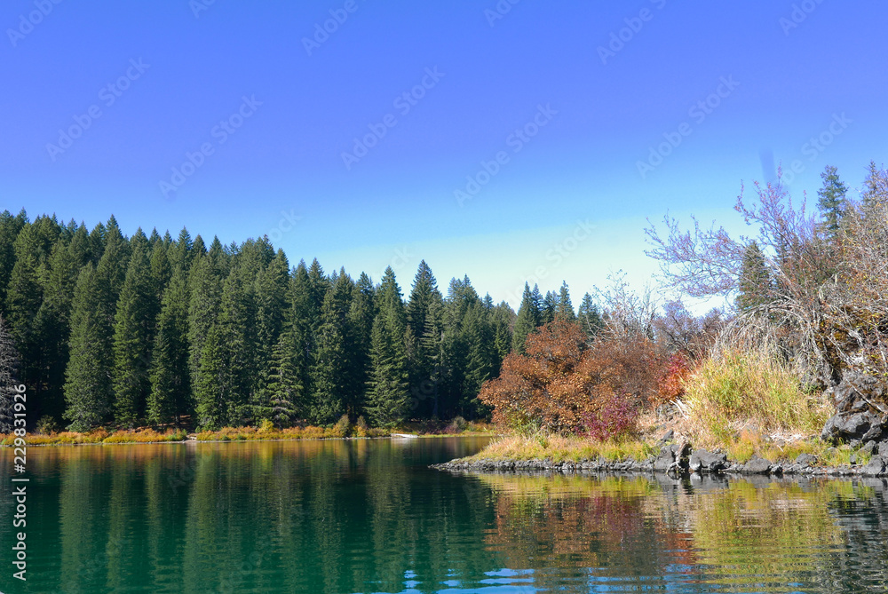 Beautiful mountain landscape with fall colors and lake