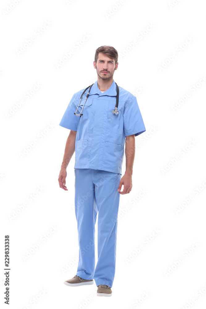 in full growth.portrait of a surgeon with stethoscope. in full growth.portrait of a surgeon with stethoscope.