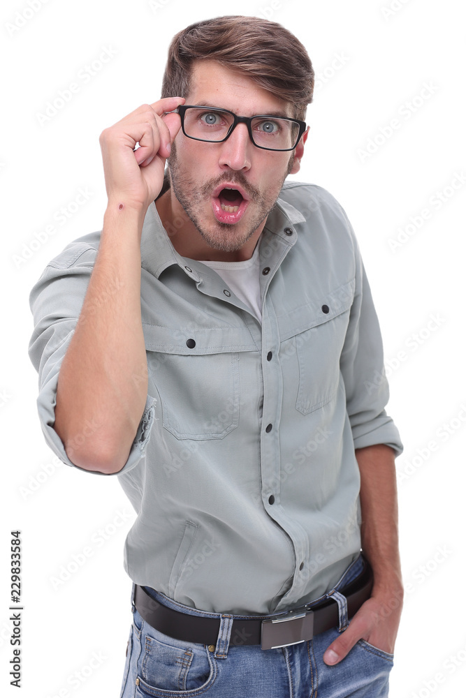 surprised young man looking through his glasses surprised young man looking through his glasses