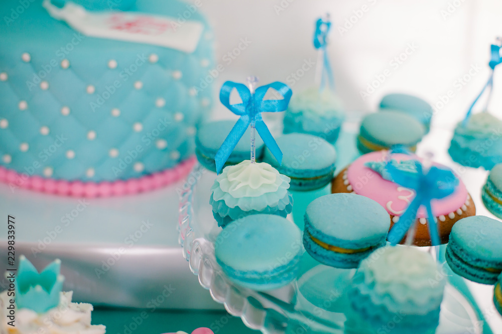 Candy bar with sweet cakes and decor items in bright pink colors. Cupcakes, muffins, ice creams, lollypops Candy bar with sweet cakes and decor items in bright pink colors. Cupcakes, muffins, ice creams, lollypops