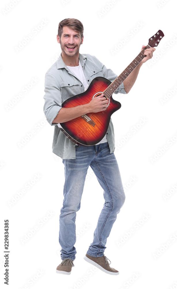 in full growth.young male musician with guitar in full growth.young male musician with guitar