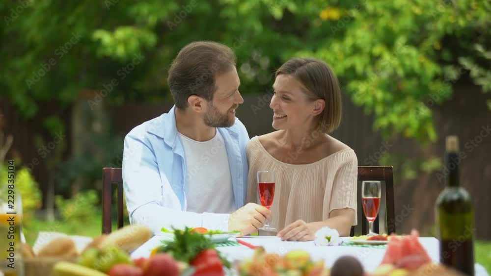 Middle-aged couple celebrating anniversary, remembering youth and dating time Middle-aged couple celebrating anniversary, remembering youth and dating time