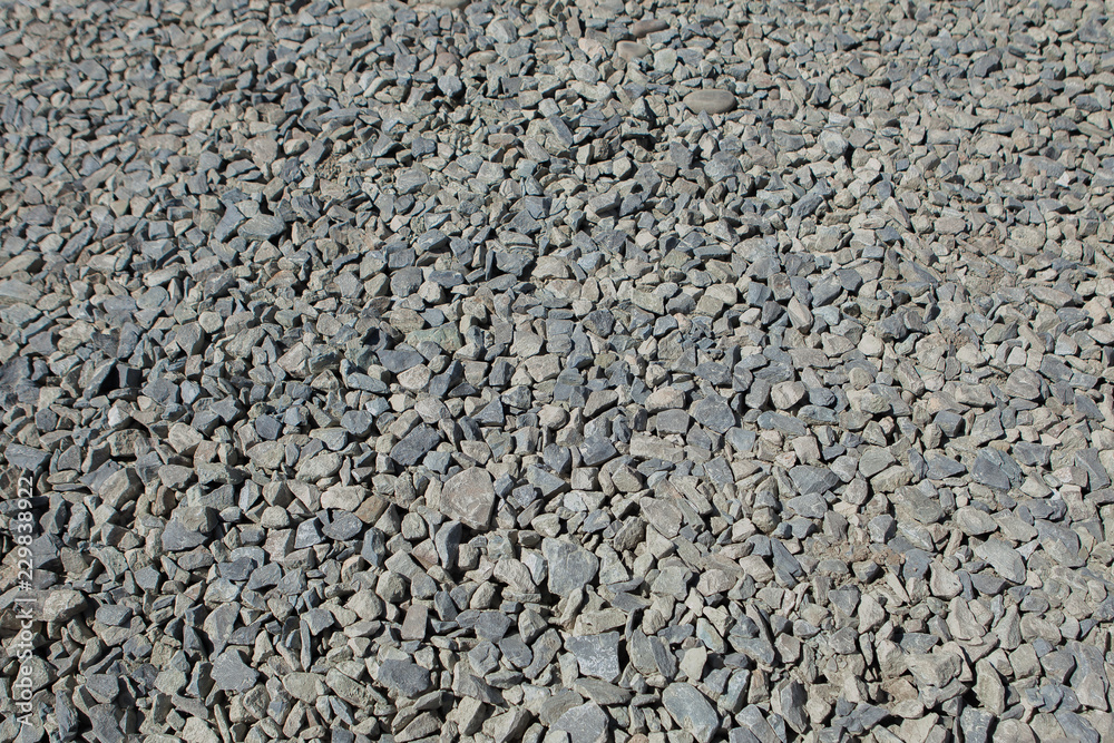 Small Rock Textured background. Seamless texture of gravel. crushed granite texture Small Rock Textured background. Seamless texture of gravel. crushed granite texture