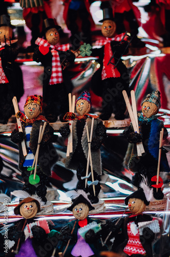 Nuremberg, Bavaria / Germany - 18 11 2009: Market stall selling traditional incense smoker wooden figures and prune men, festive handmade dolls made of plums, at the Nuremberg Christmas market