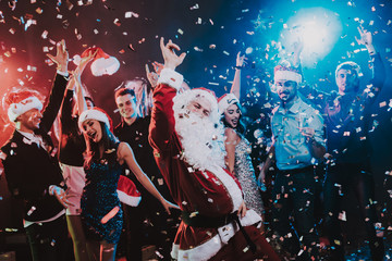 Man in Santa Claus Costume on New Year Party.