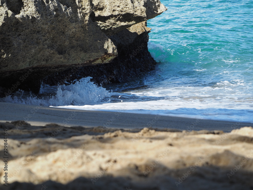 Waves on the beach. Close rock Waves on the beach. Close rock