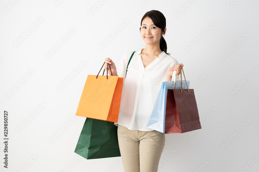 young asian woman shopping image on whtie background