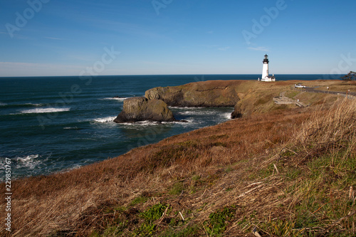 lighthouse on coast of sea