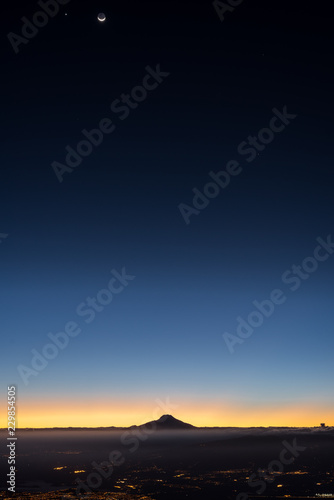 Cayambe and Quito at sunrise