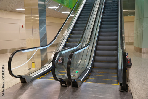 close up on escalator in the airport photo