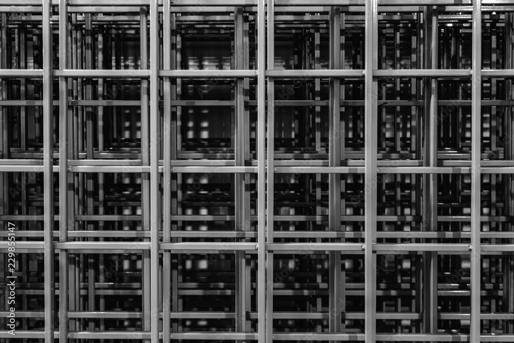 Pile of metal lattices. Abstract black and white image of grid structure 
