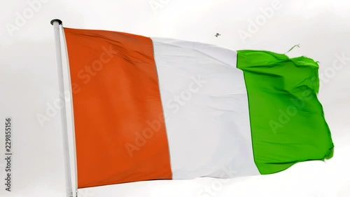 The Flag of Ivory Coast waving in the wind photo