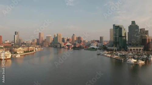 Wallpaper Mural Baltimore Inner Harbor Cinematic Water Aerial during sunrise.  Shot in 4K in H-log for complete color correction capability. Shot on Mavic 2 Pro. Torontodigital.ca
