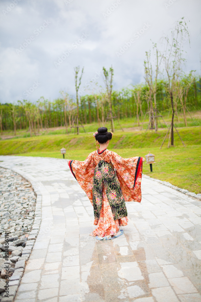 Young women wearing traditional Japanese Kimono at Japanese castle