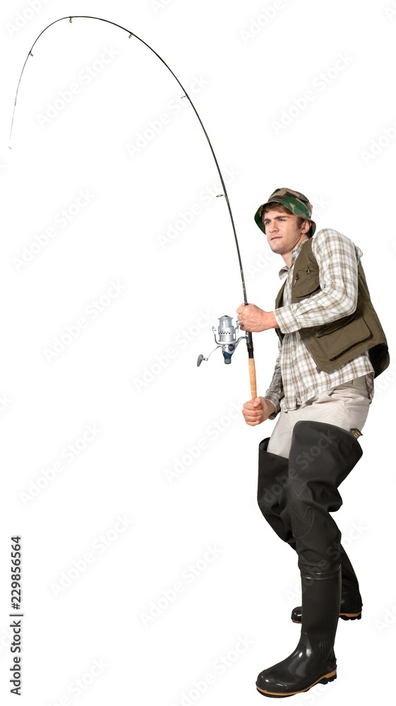 A fisherman pulls a trout out of the water on a spinning rod and puts it in  a net. Fishing on the pond, fishing equipment, breeding of river trout  13426042 Stock Video