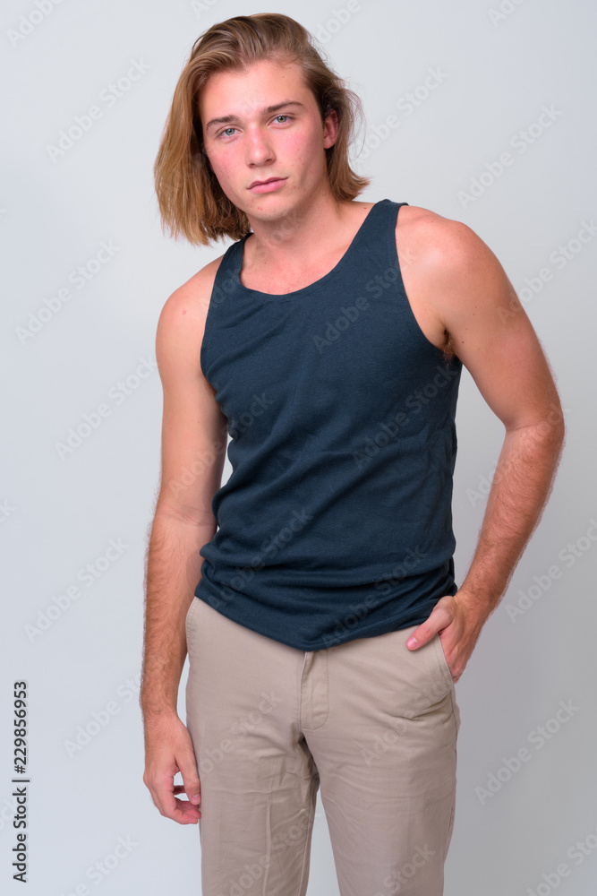 Young handsome man with long blond hair Young handsome man with long blond hair
