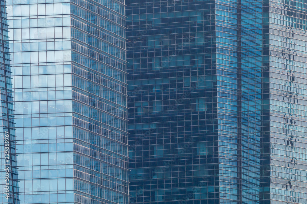 Exterior windows of tall office buildings in city Exterior windows of tall office buildings in city